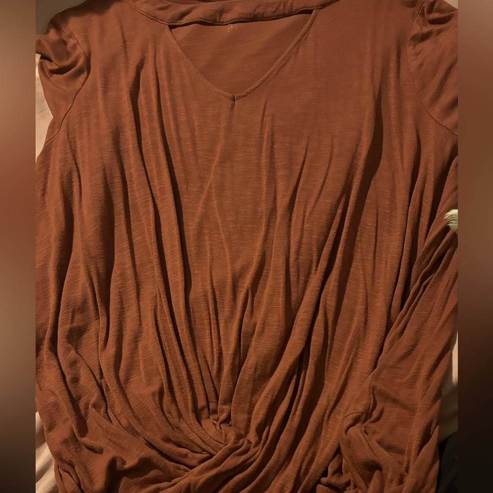 orange twist top with cutout at top
